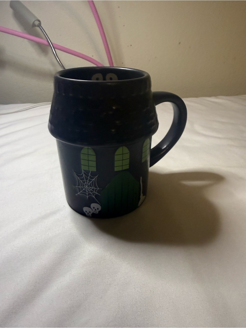 Spooky Ceramic Mug with Green Haunted House Accents